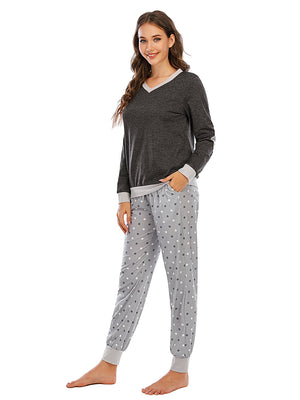 Dark grey v-neck lounge set with contrast trim and grey polka dot pants
