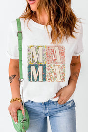 White Mama graphic tee with floral collage squares and rolled sleeves.