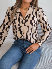 Tan abstract wave print silk-touch blouse with button front and spread collar.