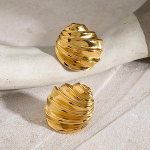 Gold sculpted spiral stud earrings with 18K gold plating.