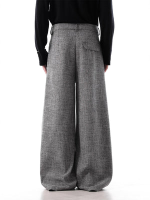 Men's grey oversized pleated wide-leg trousers with decorative chain detail