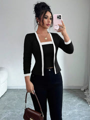 Black two-piece cardigan set with white trim and square neck tank top.