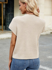 Eggshell knit cap-sleeve top with ribbed texture and a single chest pocket.