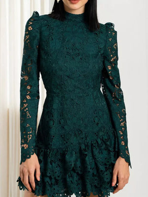Dark green floral lace mock neck mini dress with long sleeves and ruffled hem.