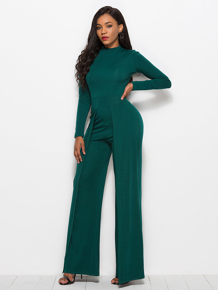 Dark green high-waisted palazzo jumpsuit with slit front and long sleeves.