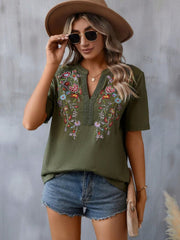 Army green V-neck tee with floral embroidery and crochet trim, short sleeves.