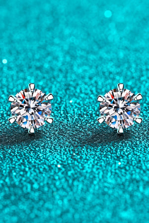 Silver six-prong solitaire stud earrings with clear cubic zirconia stones.