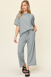 Waffle knit lounge set in Cloudy Blue with short sleeves and drawstring pants.
