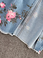 Denim cami and skirt set with pink floral print, frayed hem, and sweetheart neckline detail.
