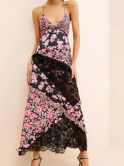 Black floral maxi dress with lace trim and asymmetrical hem