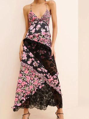 Black floral maxi dress with lace trim and asymmetrical hem