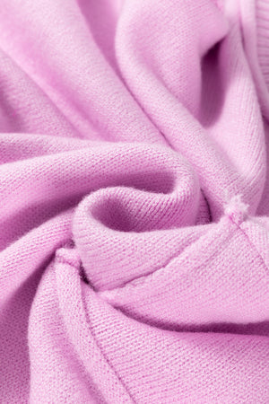 Pink knit sweater with contrast stitching detail