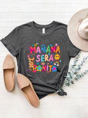 Gray graphic tee with colorful "Mañana Sera Bonito" text and cute cartoon graphics.