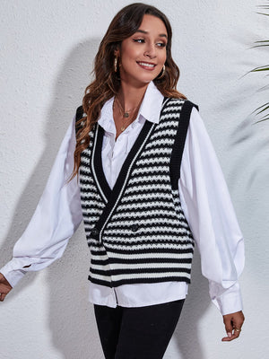 Double-breasted black and white striped knit vest with V-neck and button detail.