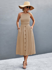 Khaki button-down midi dress with halter neck and ruffle waist detail.