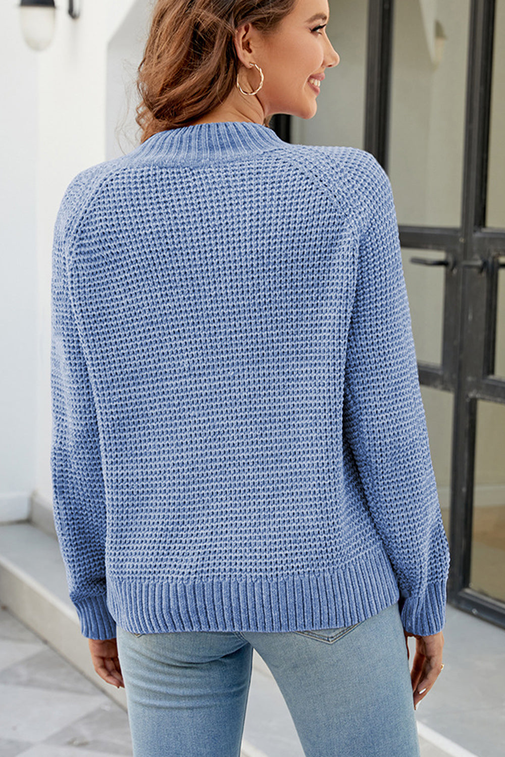 Misty Blue waffle knit raglan sleeve pullover sweater with ribbed cuffs and hem.