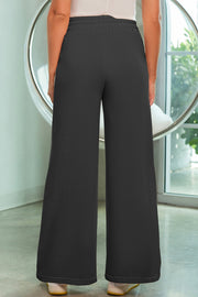 Black palazzo joggers with center seam detail and elastic waistband.