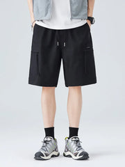 Black cargo shorts with zippered pockets and drawstring waist.