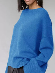 Light blue soft knit sweater with ribbed detailing and crew neck.