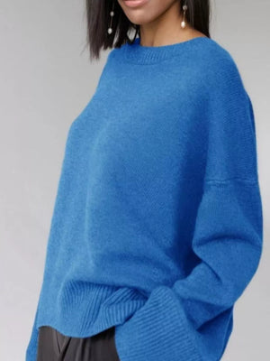 Light blue soft knit sweater with ribbed detailing and crew neck.