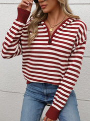 Burgundy striped zip-neck hooded knit sweater with a relaxed fit and ribbed cuffs.