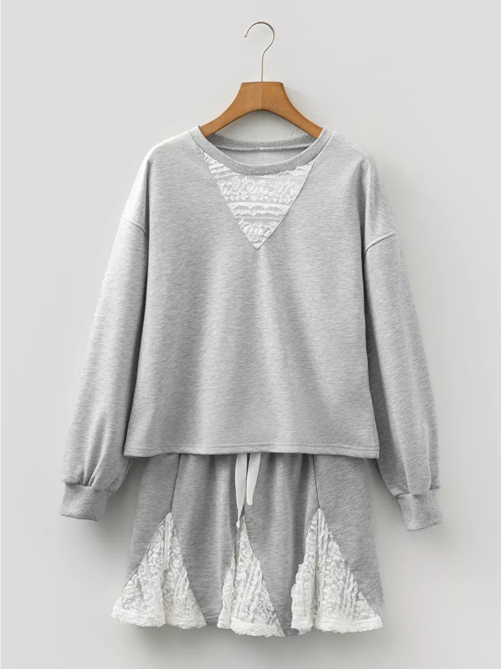 Grey cotton two-piece set with lace trim on neckline and hem.