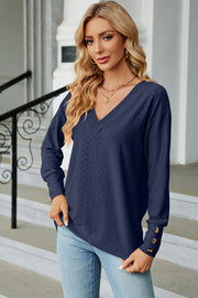 Dark Blue diamond-textured V-neck blouse with button cuff detail