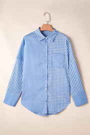 Light blue gingham oversized shirt with patch pocket and button front.