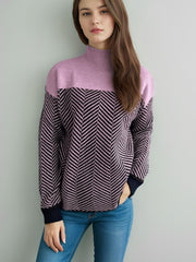 Chevron knit turtleneck sweater in lavender and dark blue with chevron pattern.