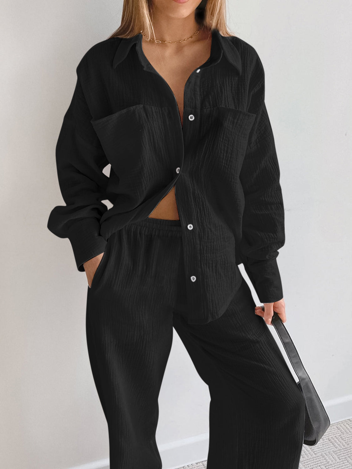 Black textured cotton lounge set with button-down shirt and wide-leg pants