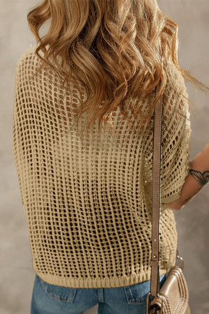 Khaki crochet mesh overlay top with floral pattern and short sleeves, styled with jeans.