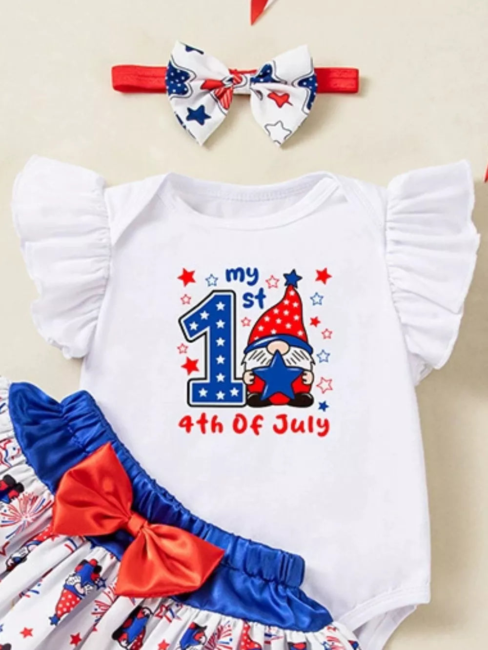 Baby 4th of July outfit set with gnome graphic and ruffled sleeves.
