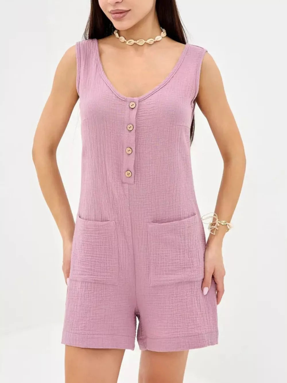 Purple crinkled cotton button-down sleeveless romper with patch pockets
