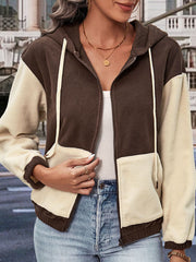 Two-tone coffee brown and cream fleece zip-up hoodie with drawstring hood and pockets.
