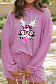 Fuchsia pink ribbed lounge set with bunny graphic and bubblegum detail.