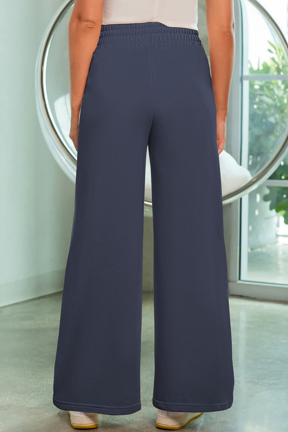Palazzo joggers in French Blue with elastic waist and center seam detail.