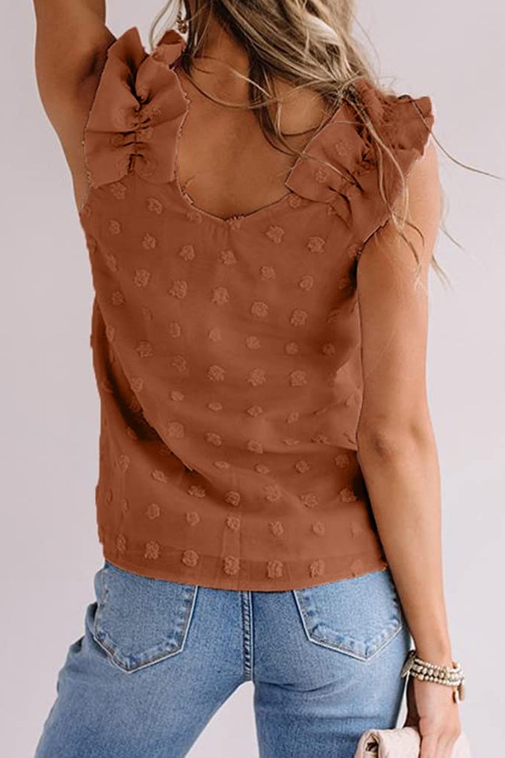 Caramel textured ruffle sleeve tank top with a v-neckline.