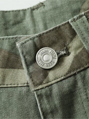 Relaxed fit camouflage cargo pants with a silver button closure detail.