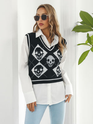 Black argyle knit vest with skull motif, V-neck, sleeveless, 100% acrylic.