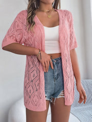 Blush pink open-knit cardigan with diamond pattern and short sleeves.