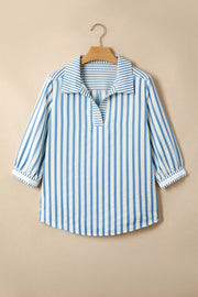 Blue and white striped collared blouse with textured fabric and 3/4 sleeves.