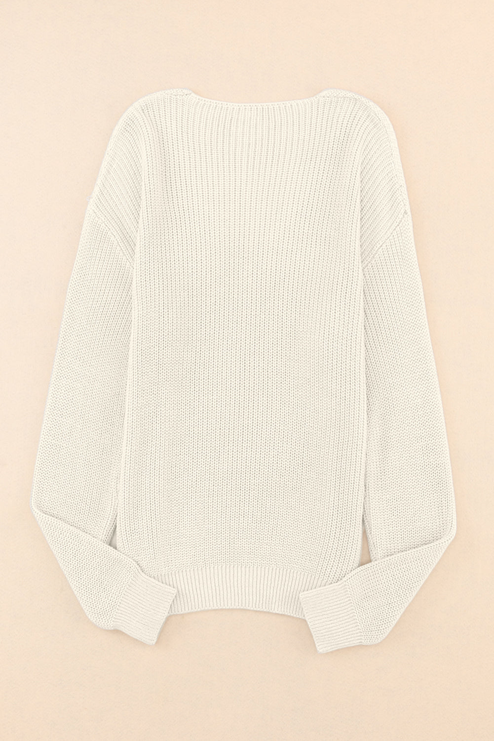 Relaxed knit V-neck pullover sweater in beige with ribbed cuffs and hem.