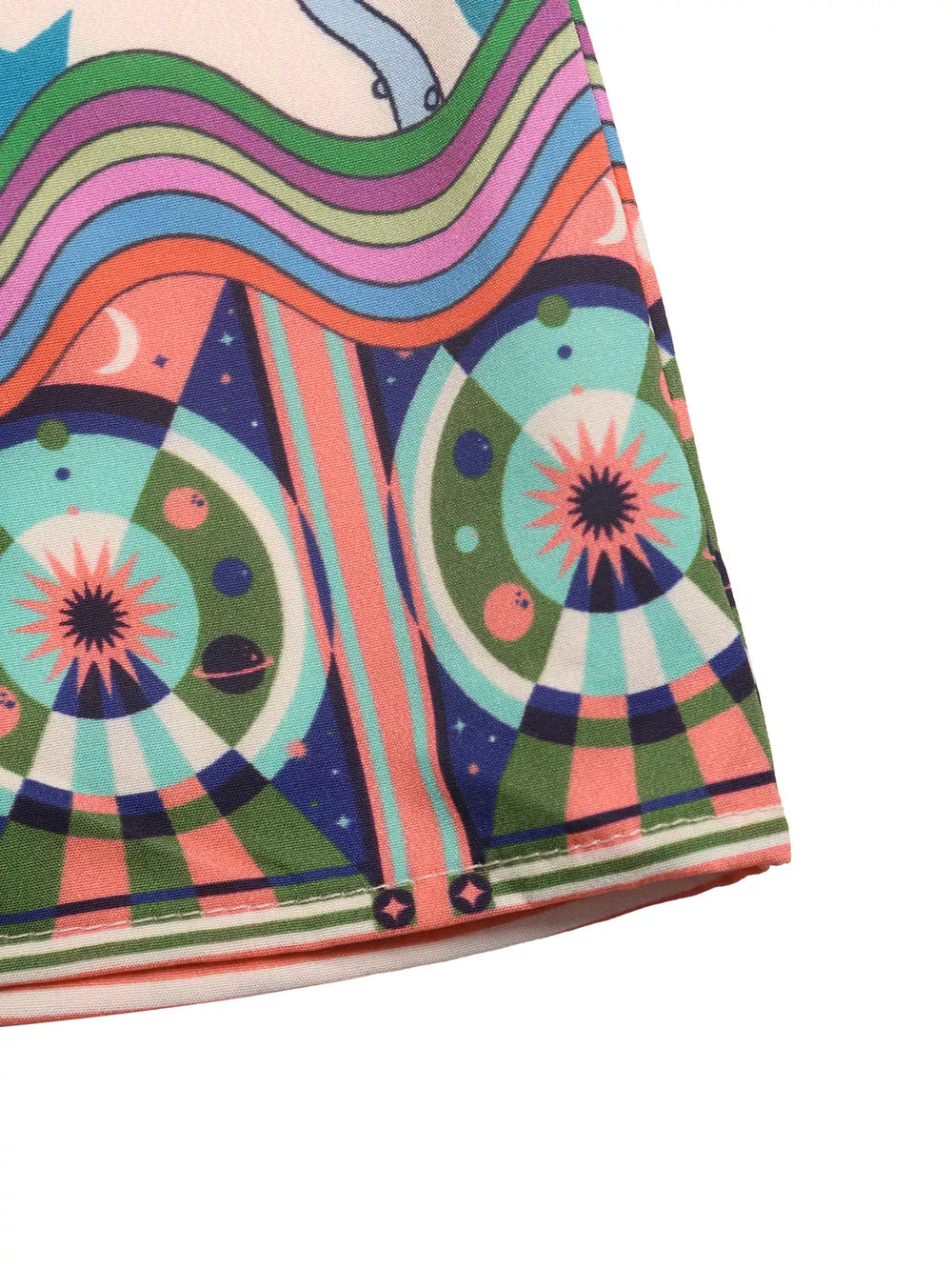 Smocked romper with colorful retro space print and wavy stripes.
