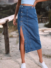 Button-front denim midi skirt in blue with a high slit and button detail.