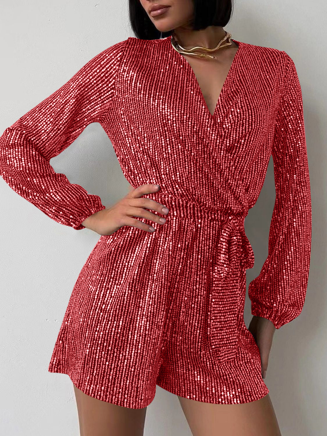 Scarlet sequin wrap romper with blouson sleeves and tie waist