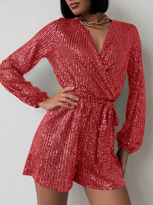 Scarlet sequin wrap romper with blouson sleeves and tie waist