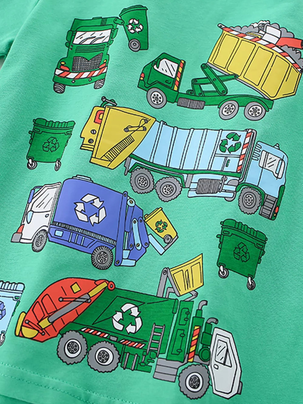 Toddler green cotton t-shirt with a whimsical truck print featuring garbage trucks and recycling bins.