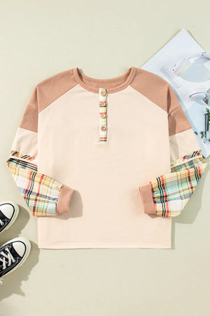 Raglan henley top in tan with plaid sleeves and button detail