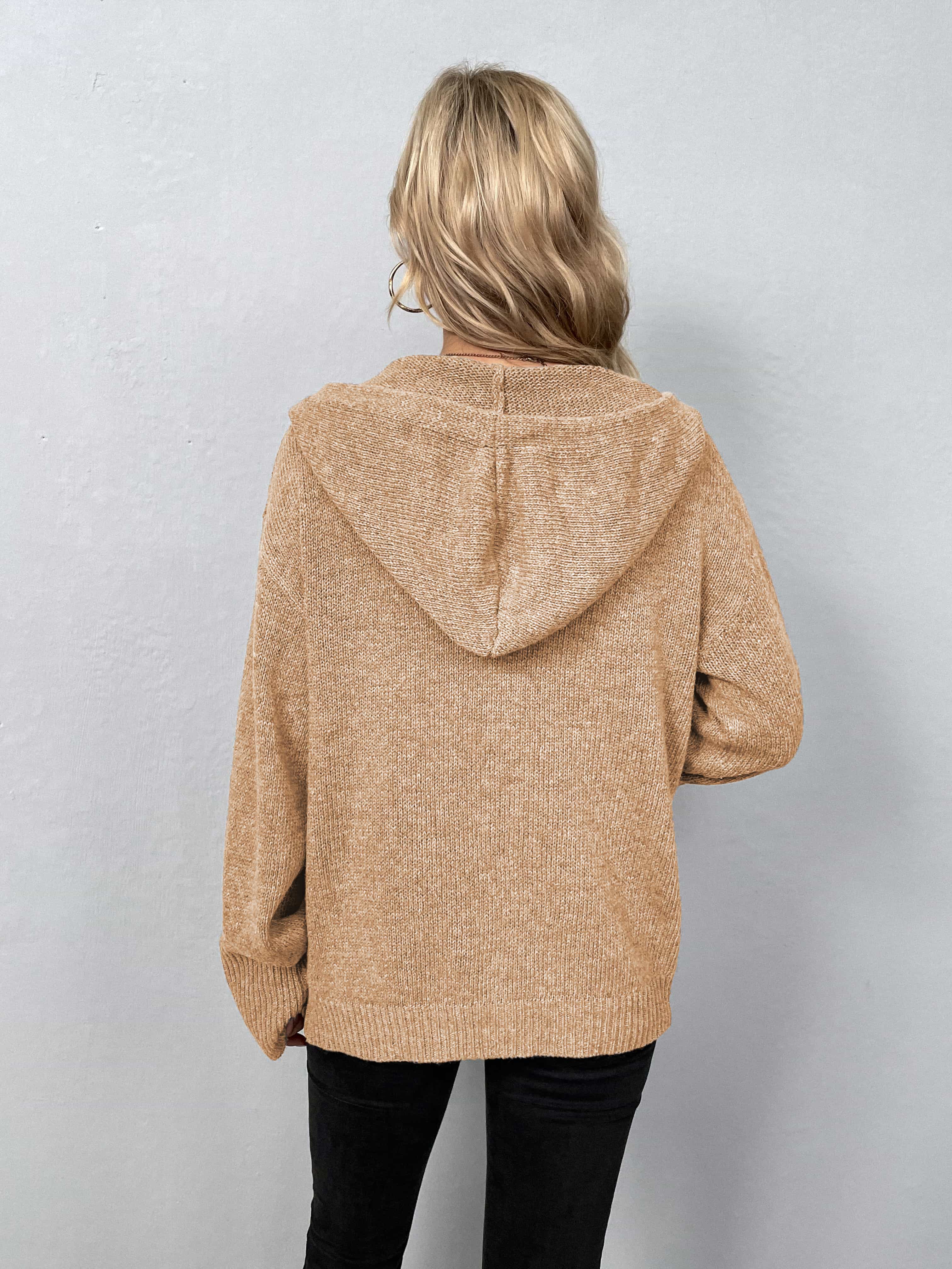 Tan hooded knit cardigan with button front and ribbed cuffs and hem.