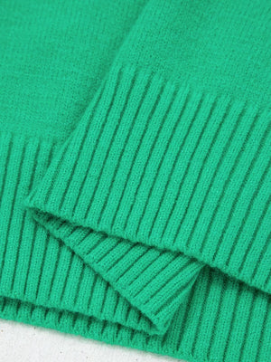Green ribbed knit top with ruffled detail and round neck